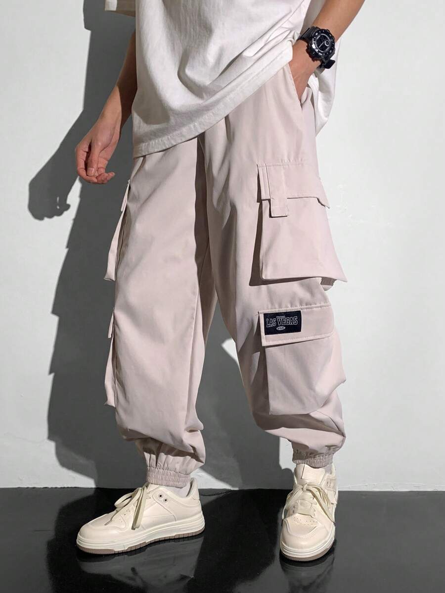 SHEIN Teen Boys 1pc Casual Hip Cool Style Loose Windbreaker Material Large Patch Pockets Street Retro College Style Cargo Pants