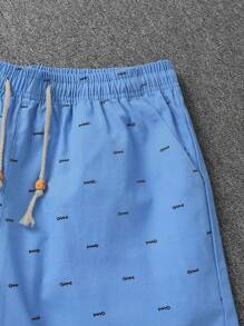 Manfinity RSRT Pantalones cortos holgados con cordón en la cintura y bolsillos, estampado de letras, para hombre. Pantalones cortos de verano para hombres, ropa de verano para hombres, pantalones cortos de hombre, pantalones cortos de playa para hombre