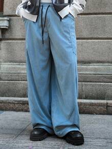 Manfinity Streetrush Pantalon large en velours côtelé pour homme, style streetwear, avec grande poche et conception de broderie de machette fendue