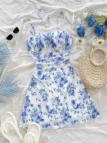 Soleia فستان أنيق مصمم للنساء بطبعة زهور ملونة باللون الأزرق والأبيض، بخصر مكشكش وتنورة قصيرة، مناسب للحفلات والمواعيد والأزياء الصيفية والشاطئ والعطلات