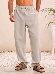 SHEIN X ELOISA & ORSON Manfinity VCAY Pantalones casuales sueltos de hombre de unicolor, de cintura elástica y pierna recta, estilo cómodo para uso diario y joven