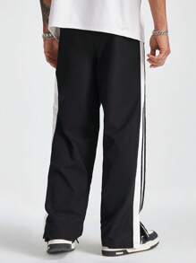 Manfinity RebelGame Quần ống đứng kẻ sọc ngang đơn giản cho nam - màu đen - Xem 2