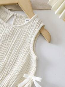 SHEIN Playful Pals Baby Girl Infant Toddler 0-3 Years Old Spring/Summer Casual Everyday Outing Textured Knit Wave Striped Beige/Almond Sleeveless Top With Side Bow