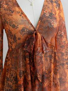 Soleia 复古印花 V 领前蝴蝶结喇叭袖不对称荷叶边下摆女士衬衫，度假装