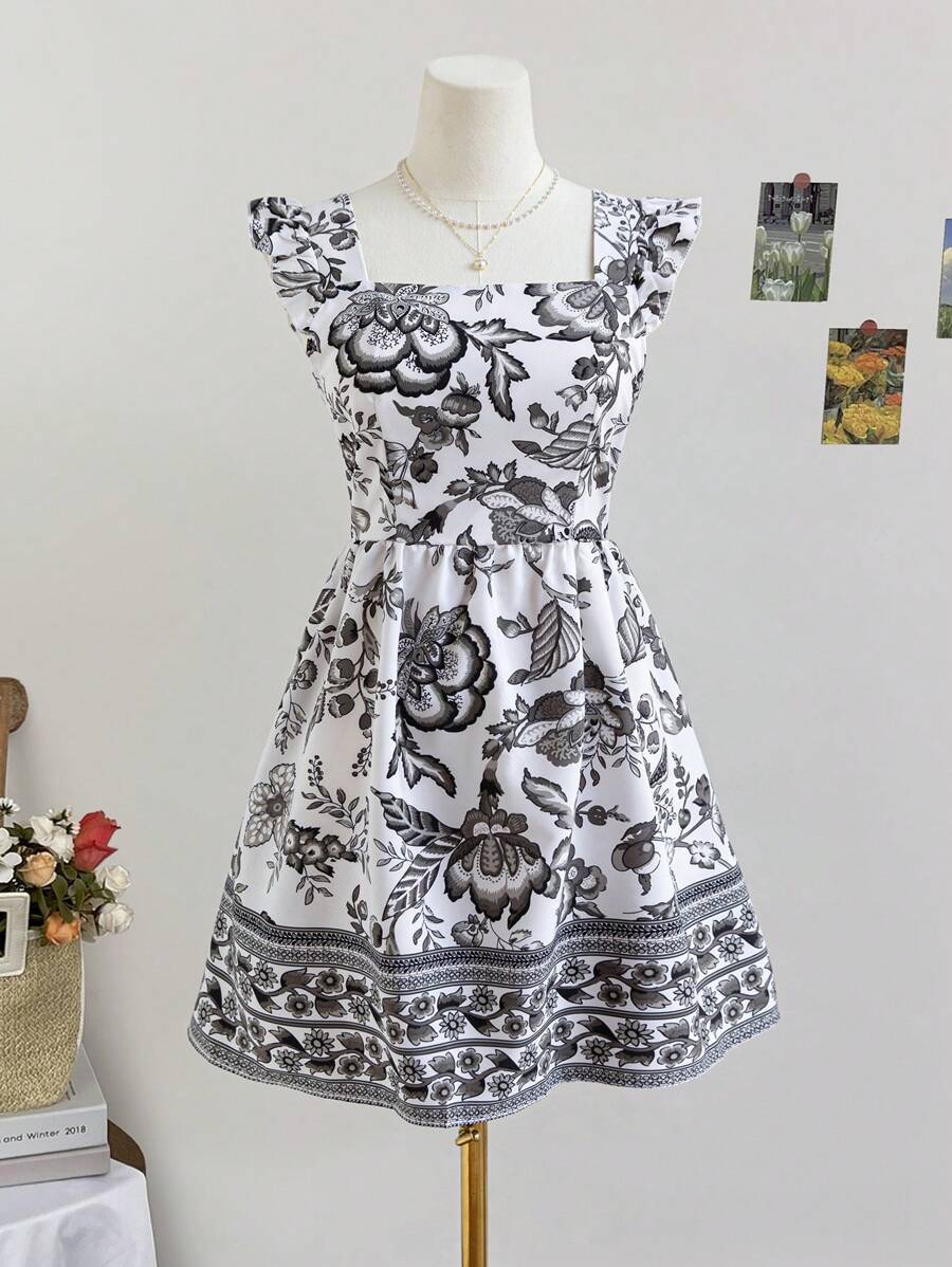 Soleia 休闲度假盖袖露背系带定位印花蓝白印花女式连衣裙