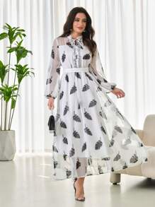 Modelyn Kleid für Damen mit Mesh- und digitalem Muster-Einsatz, Schleifenbesatz und Volant-Saum mit Langarm