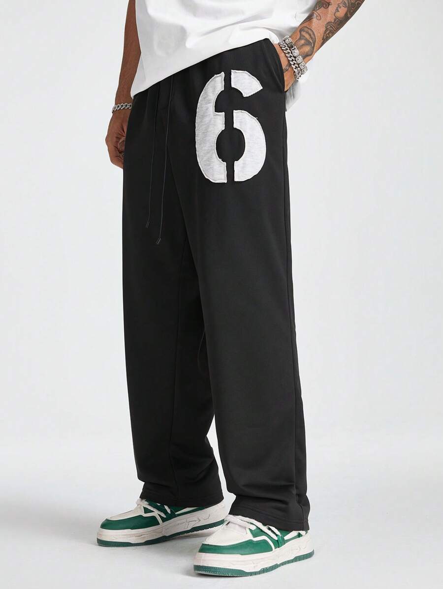 Manfinity RebelGame Men's Loose Embroidered Knit Sweatpants - Black - View 1