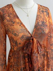 Soleia 复古印花 V 领前蝴蝶结喇叭袖不对称荷叶边下摆女士衬衫，度假装