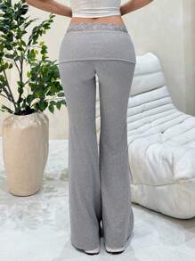 Comfortcana 女式纯色蕾丝下摆修身喇叭裤