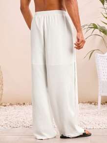SHEIN X ELOISA & ORSON Manfinity VCAY Pantalones rectos informales de hombre de unicolor con cintura elástica y silueta holgada