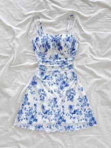 Soleia فستان أنيق مصمم للنساء بطبعة زهور ملونة باللون الأزرق والأبيض، بخصر مكشكش وتنورة قصيرة، مناسب للحفلات والمواعيد والأزياء الصيفية والشاطئ والعطلات
