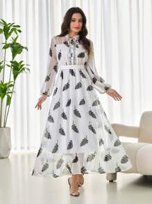 Modelyn Kleid für Damen mit Mesh- und digitalem Muster-Einsatz, Schleifenbesatz und Volant-Saum mit Langarm