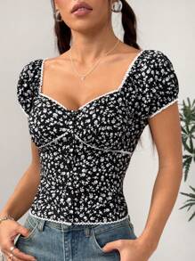 Flirla Blouse à encolure carrée, manches bouffantes et panneaux avec imprimé floral noir éparpillé pour femmes