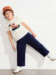 SHEIN 2pcs Toddler Boys Dog Graphic Round Neck Loose Beige T-Shirt And Casual Pocket Loose Navy Blue Pants Set, Casual & Cute Style - Beige - View 4