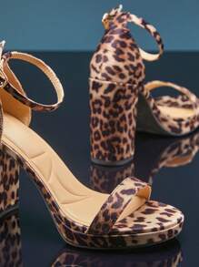 SHUZIA 节日必备女士黑色粗跟凉鞋 – 简约系带和踝扣，低调奢华又舒适