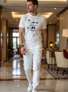 Manfinity VCAY Conjunto casual de 2 piezas para hombre - Camiseta de manga corta con ajuste holgado y pantalón recto de cintura elástica - Blanco - Ver 1