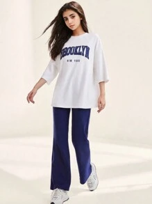 SHEIN Teen Girl Loose White Knitted Mid-Sleeve T-Shirt With Letter Print And Blue  Flared Pants Sports Casual 2pcs Set