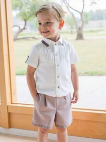 SHEIN 2 Pieces Set Young Boys Casual Sport Academy With Collar Front Pleated Sleeves With Cuff Buttons Short-Sleeved Shirt And Suit Shorts Gentleman's Outfit Kids Outfits Young Boy Clothes Back To School Boys Set Suitable For Birthday Party, Party, Performance, Wedding, Baptism, Opening Ceremony Suitable For Daily Suitable For School Suitable For Travel Suitable For Spring And Summer Season
