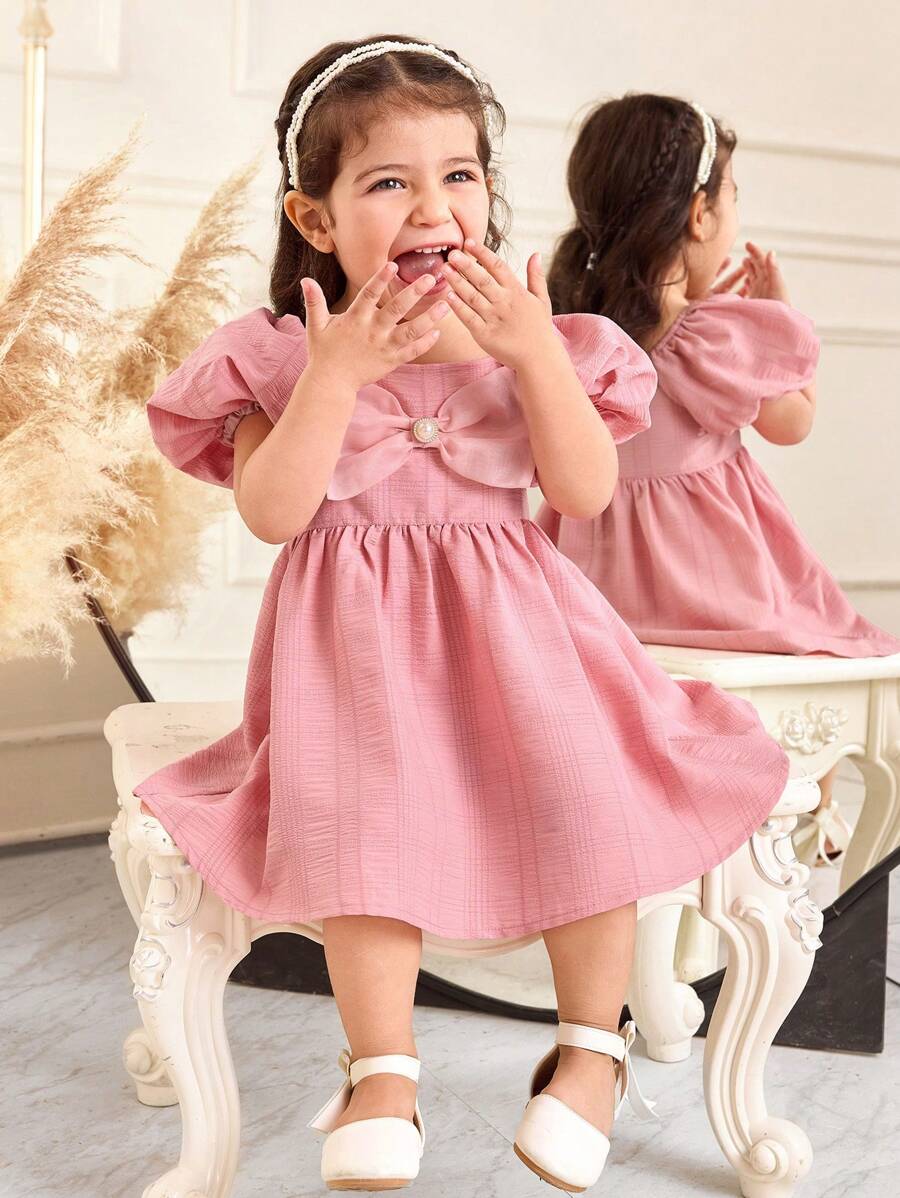 SHEIN Vestido casual y elegante para bebé niña con mangas farol, estampado floral de jacquard de organza y decoración de gran lazo - Rosa vieja - Ver 1