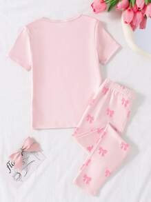 SHEIN 年轻女孩两件套睡衣套装，浅粉色短袖上衣，蝴蝶结设计，搭配长裤，休闲舒适睡衣