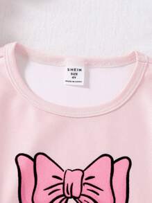SHEIN 年轻女孩两件套睡衣套装，浅粉色短袖上衣，蝴蝶结设计，搭配长裤，休闲舒适睡衣
