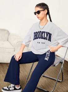 SHEIN Teen Girl Loose White Knitted Mid-Sleeve T-Shirt With Letter Print And Blue  Flared Pants Sports Casual 2pcs Set