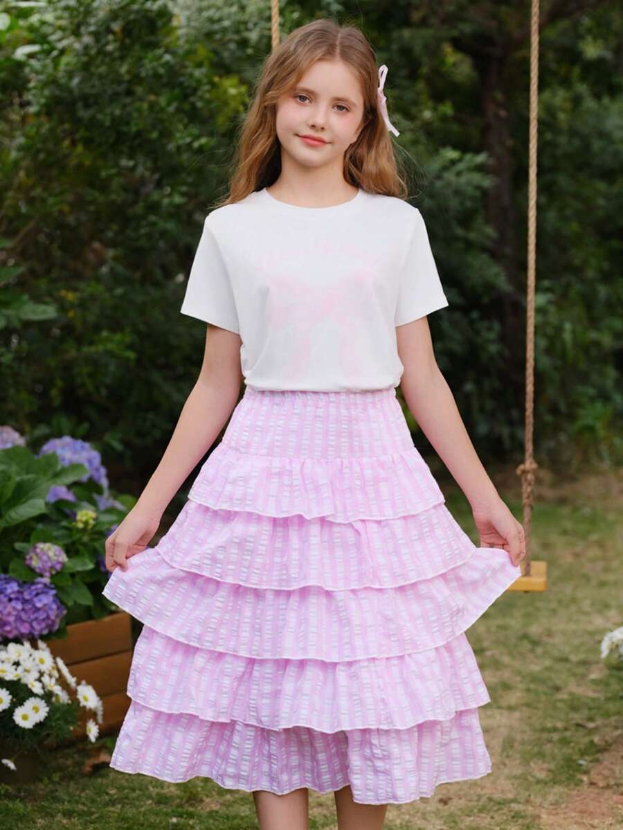 SHEIN Tween Girls 2pcs Bowknot Short Sleeve Top And Plaid Multilayer Cake Skirt Set, Cute & Sweet Style, Suitable For Outings, Social Media Photos - Pink - View 1