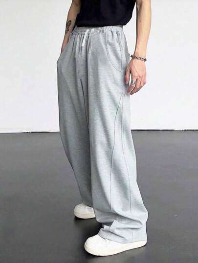 SHEIN 休闲、舒适、时尚、百搭的青少年男孩运动裤，具有简单的轮廓和拼接设计，适合日常穿着、上学、旅行、运动