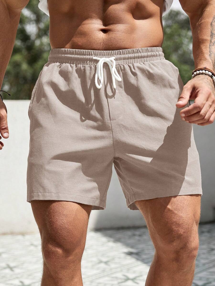 Manfinity Homme Celana Pendek Kasual Sederhana Pria Warna Polos dengan Tali Depan dan Saku - Aprikot - View 1