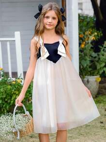 SHEIN Vestido elegante, hermoso y adorable para niña preadolescente, sin tirantes, con manga de malla abullonada y lazo, en negro y blanco, apropiado para verano y primavera, ideal para fiestas y vacaciones - Blanco y Negro - Ver 8