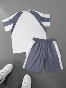 Manfinity Hypemode Conjunto de top y shorts minimalista para hombres con bloqueo de color y estampado de letras de carreras