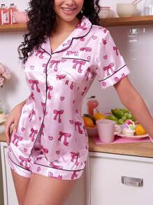 SweetSlumber Conjunto de pijama de top de manga corta y pantalones cortos con estampado de corazón y lazo para mujer