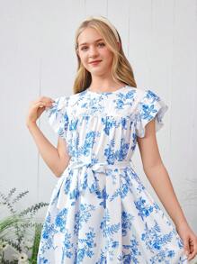 Elegante vestido para niñas adolescentes con estampado floral azul y encaje