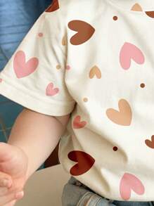 SHEIN 年轻女孩休闲复古心形图案短袖圆领 T 恤，适合夏季