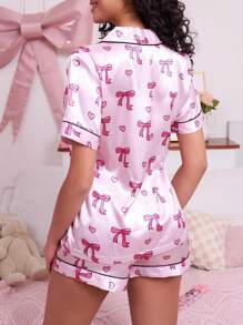 SweetSlumber Conjunto de pijama de top de manga corta y pantalones cortos con estampado de corazón y lazo para mujer