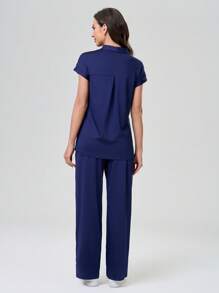 TaskEZ 纯色短袖插肩袖简约上衣和全长裤 护士手术服套装 手术服套装 护士手术上衣 手术裤 跑步护士和制服手术服 洗手口袋透气拉绒服装套装 带口袋的手术弹力运动工作服 手术上衣和裤子套装 女士手术套装：缺口 V 领塞入式上衣和直筒裤 基本慢跑手术套装 护士制服弹力上衣和抽绳工装裤 - 藏蓝色 - 查看 2