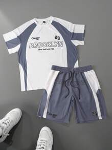 Manfinity Hypemode Conjunto de top y shorts minimalista para hombres con bloqueo de color y estampado de letras de carreras