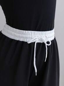 Wildeya Teenager Mädchen Set aus ärmelloser Kontrast Schwarz & Weiß Bluse und hochgeschnittener Weite Strick Hose, lässiger Basic für Sport