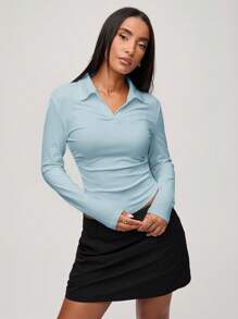 SHEIN BASICS Blusa de punto de unicolor casual con cuello vuelto, cierre de media cremallera delantera y lados fruncidos, de manga larga para mujer