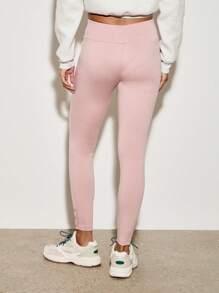 AiiRZ Mallas de alto rendimiento de alta cintura con detalle en la parte delantera, pantalones de entrenamiento transpirables para yoga, y entrenamiento, tela suave al tacto con adorno en el tobillo - Rosa - Ver 2