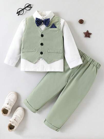 SHEIN Conjunto de 3 piezas estilo casual elegante para bodas/escenario para niño pequeño. Conjunto de chaleco de ajuste delgado de unicolor + pantalón de traje casual + pajarita a lunar desmontable de 3 piezas, con pañuelo de contraste de color en el pecho y pajarita