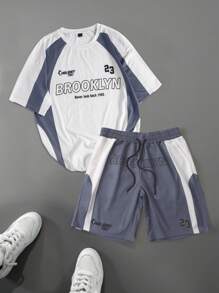 Manfinity Hypemode Conjunto de top y shorts minimalista para hombres con bloqueo de color y estampado de letras de carreras