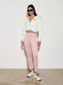 AiiRZ Mallas de alto rendimiento de alta cintura con detalle en la parte delantera, pantalones de entrenamiento transpirables para yoga, y entrenamiento, tela suave al tacto con adorno en el tobillo - Rosa - Ver 3