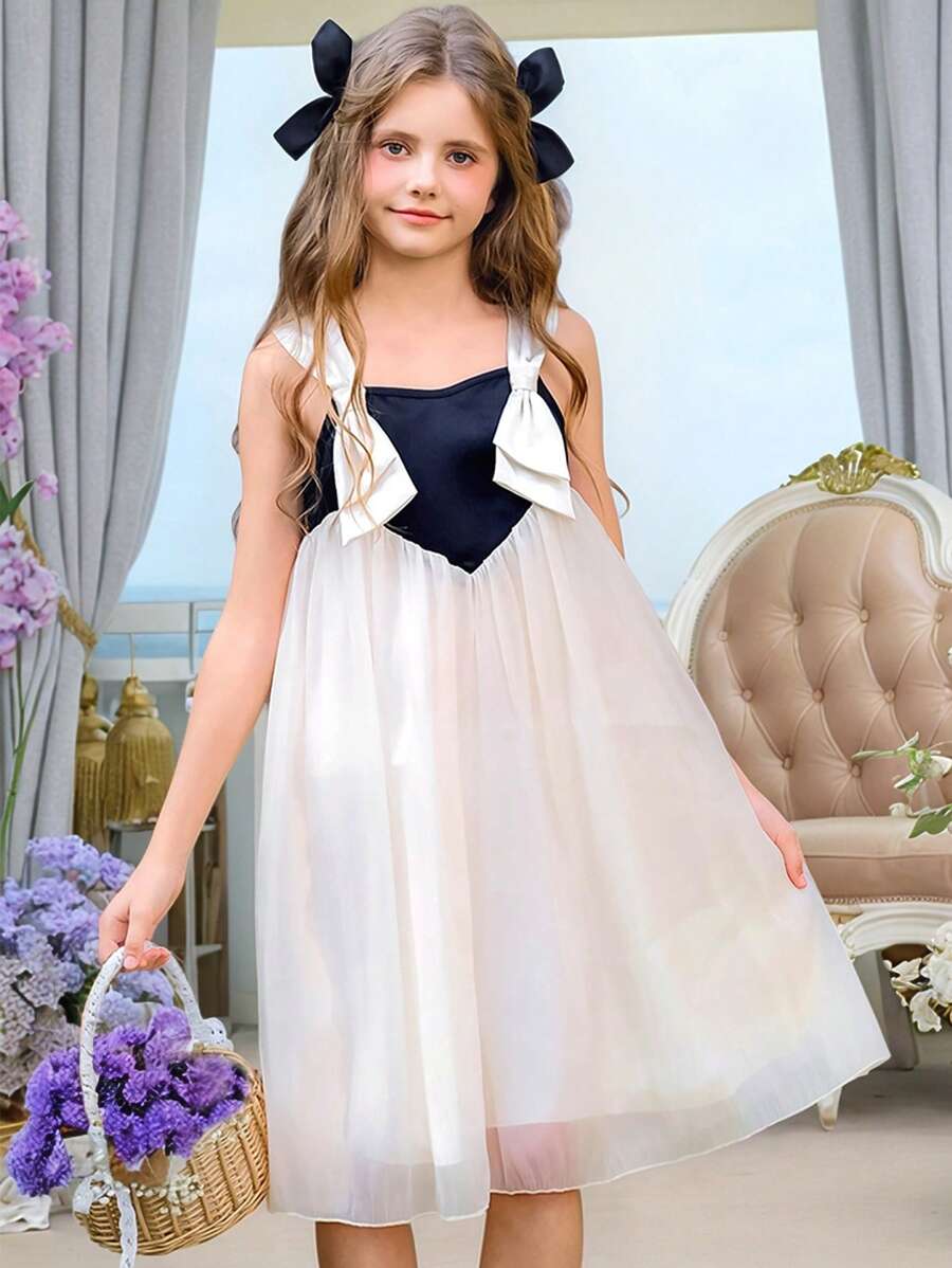 SHEIN Vestido elegante, hermoso y adorable para niña preadolescente, sin tirantes, con manga de malla abullonada y lazo, en negro y blanco, apropiado para verano y primavera, ideal para fiestas y vacaciones - Blanco y Negro - Ver 1