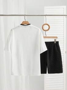 Manfinity VCAY Set de 2 piezas de camiseta de manga corta de punto y pantalón corto de cintura media recta de ajuste holgado y de doble capa con cuello alto, unisex, ideal para uso diario