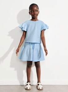 THE HAPPY LOOK Conjunto de 2 piezas para niñas jóvenes: blusa azul con volantes y falda de cintura elástica con patchwork