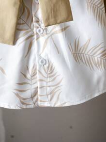 Set de 2 piezas con Top de manga corta con botones estampada y pantalones cortos para niño pequeño