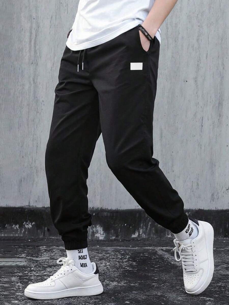 Manfinity Homme Men's Street Casual Drawstring Waist Cargo Pants,Perfect As Gifts For Boyfriends Or Husbands Men Joggers Men Jogger Men Pants,Solid Waistband Loose Rope Leggings For Men, Suitable For Everyday Outdoor Hiking - Black - View 1