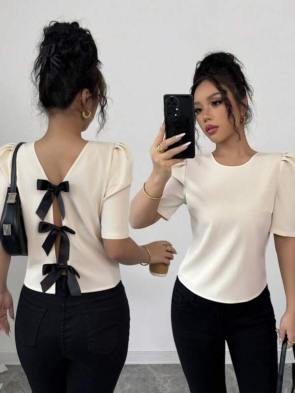 Elenzga Camisa de mujer con cuello redondo, mangas cortas abombadas y decoración de moño en la espalda