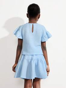 THE HAPPY LOOK Conjunto de 2 piezas para niñas jóvenes: blusa azul con volantes y falda de cintura elástica con patchwork